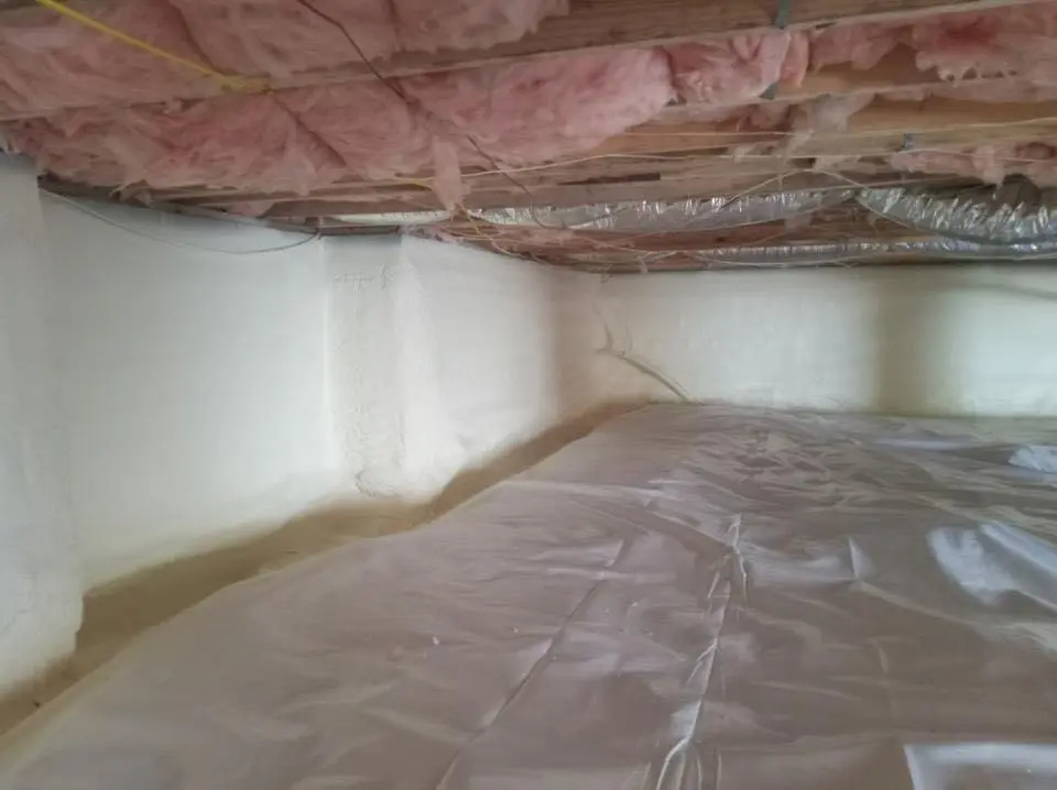 Crawl space encapsulation with closed-cell spray foam for Flat Roof Repair in Grosse Ile